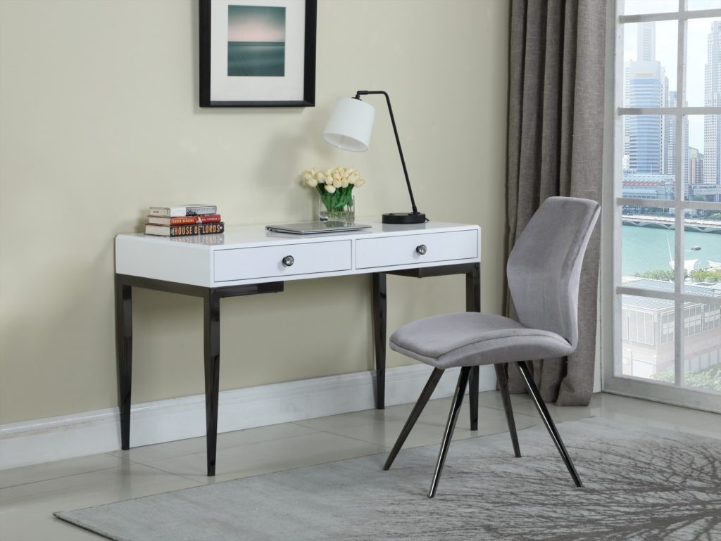 Beautiful white desk that is perfect furniture piece for a small apartment.