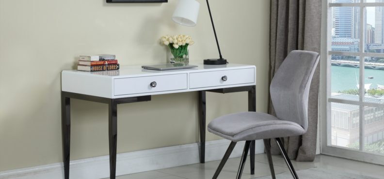 Beautiful white desk that is perfect furniture piece for a small apartment.