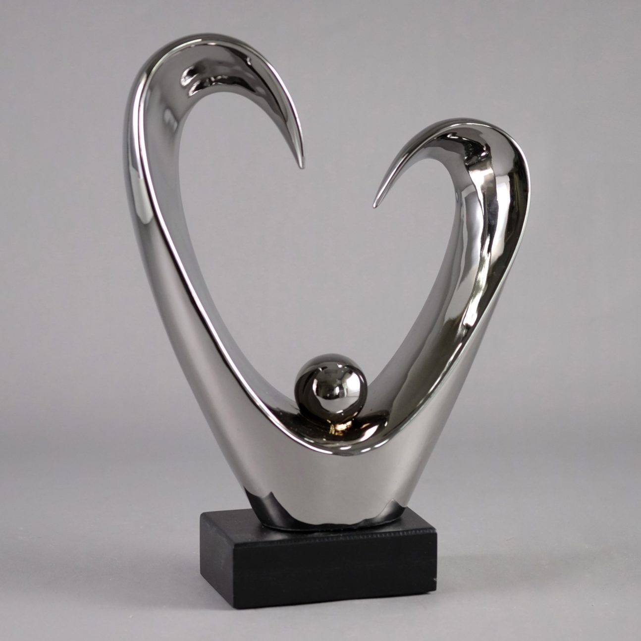 SILVER CIRCLE SPHERE SCULPTURE