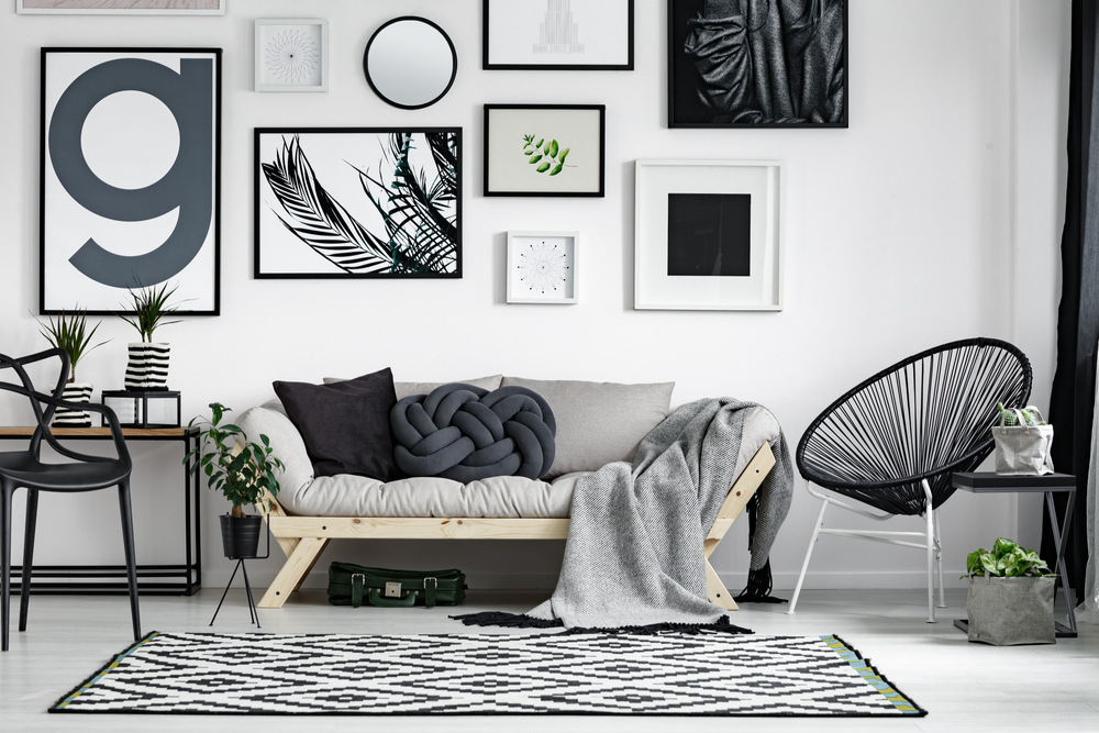 art, on, wall, in, a, home, with, couch, in, front