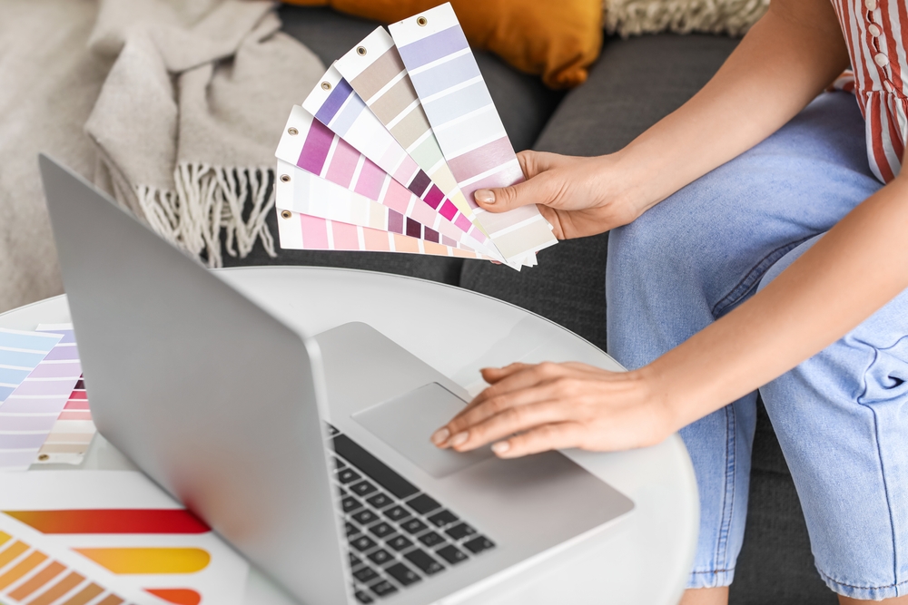 woman, holding, colour, palettes, with, laptop